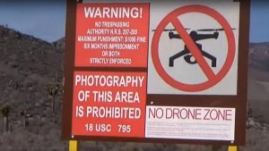 sign in national park showing that drones are banned